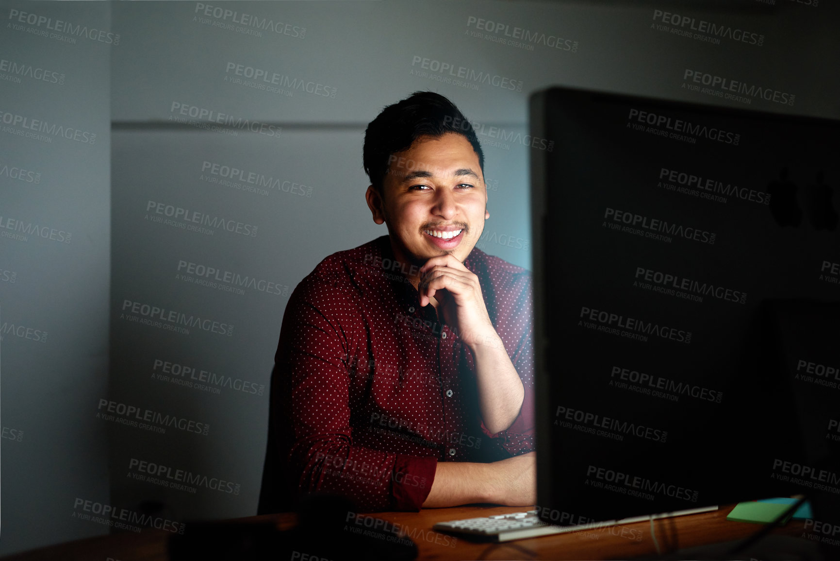 Buy stock photo Smile, man and computer at night in office of coding, problem solving and software design as Developer. Male person, programmer and pc update with IT help for deadline maintenance by working late