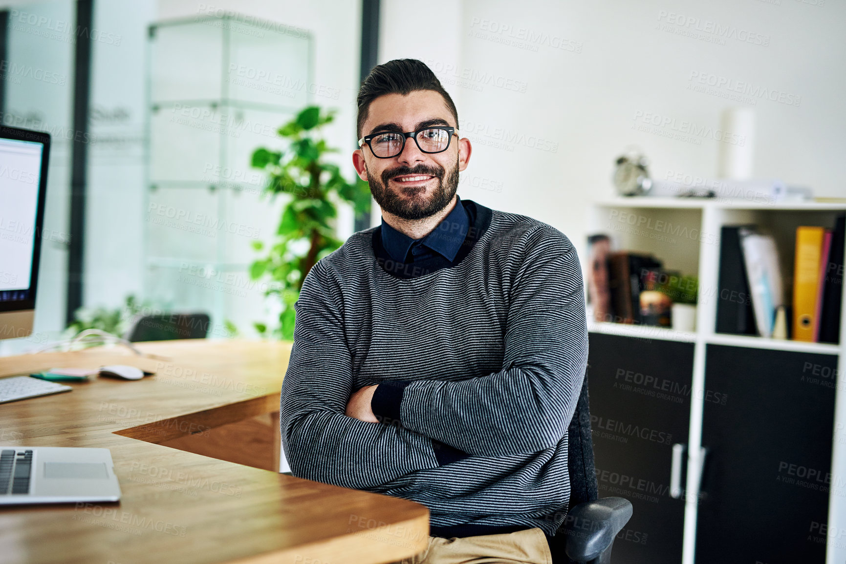 Buy stock photo Happy, crossed arms and portrait of businessman at desk with company pride, confidence and smile in office. Creative startup, professional agency and person for web design, work and designer job