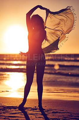 Buy stock photo Silhouette of a woman on the beach at sunset