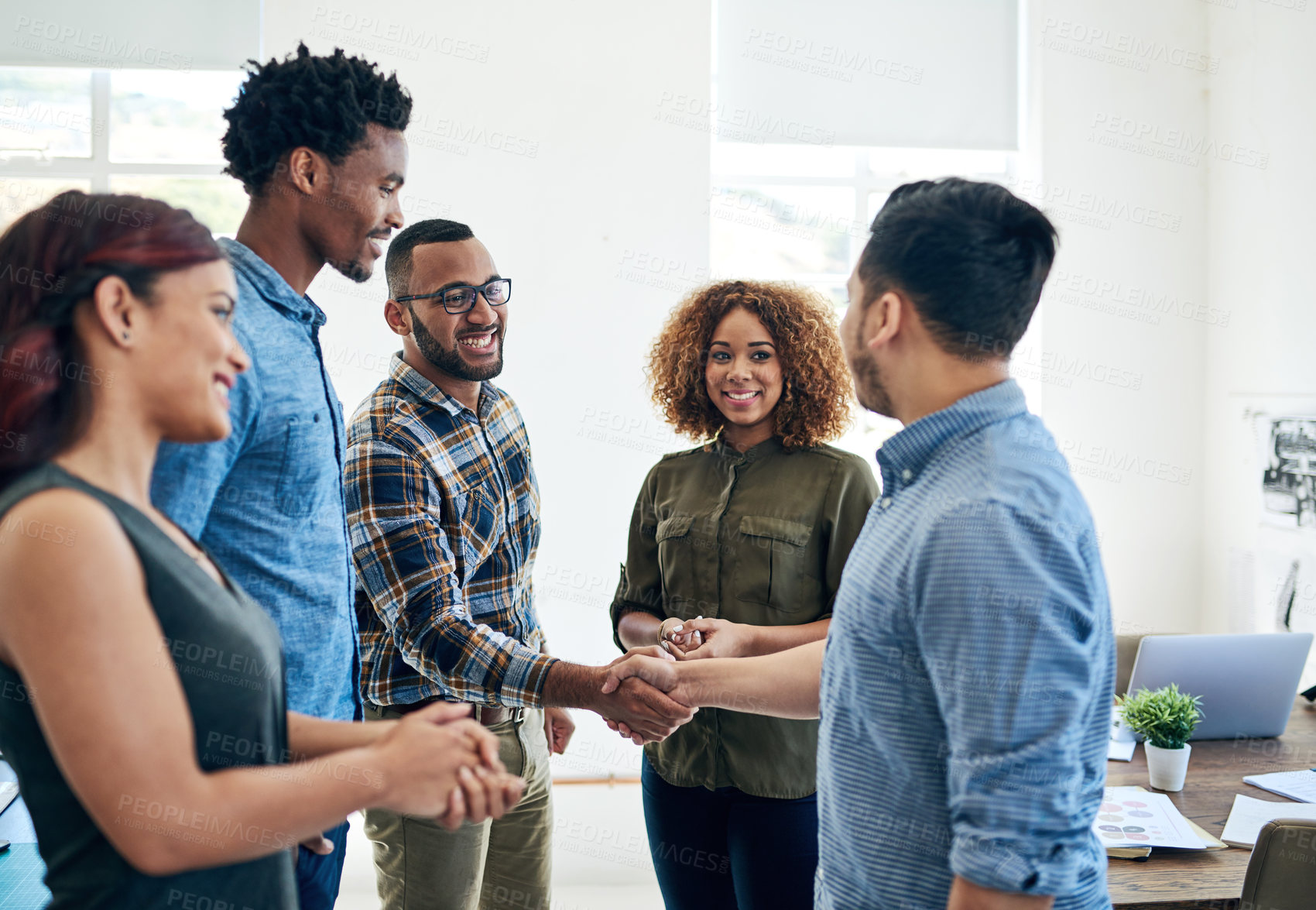 Buy stock photo Creative, people and shaking hands in business meeting introduction, welcome or onboarding at startup agency. Group or team with handshake for collaboration, internship and project deal in office