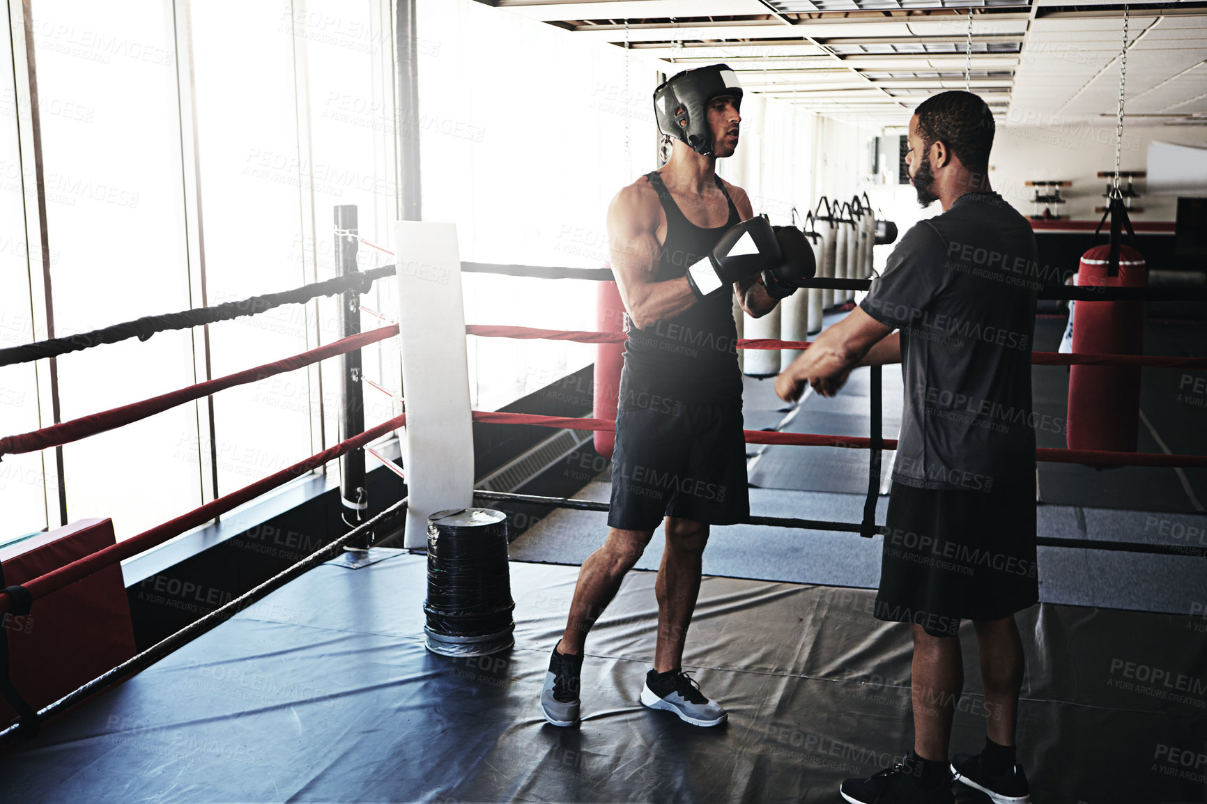 Buy stock photo Boxing, men and fitness with training, wellness and motivation with endurance, coaching and challenge. People, trainer and athlete with energy, gloves and progress with practice, support and healthy