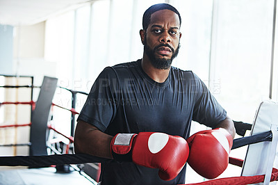 Buy stock photo Black man, boxer and portrait for fitness, training or exercise workout ready for fight at gym. African fighter, boxing and competitive sports for ring match, health and wellness with endurance