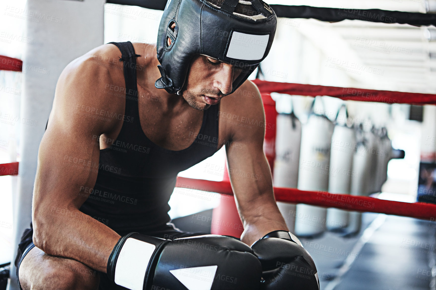 Buy stock photo Depression, boxer and man in ring at gym for challenge, fitness exercise and fail training competition for body health. Stress, fight and sport athlete resting on break for defeat, tired or fatigue