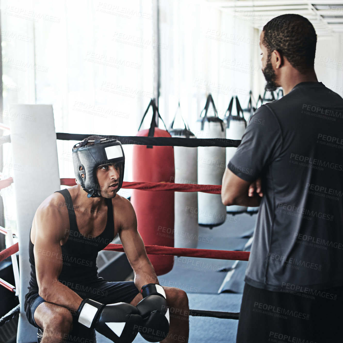Buy stock photo Man, boxer and coach talk in boxing ring for fitness, motivation and training instructions. Person, personal trainer and explain in arena for fight preparation, punch technique and advice for combat