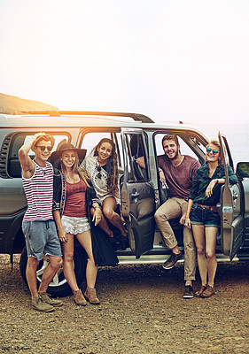 Buy stock photo Portrait of a group of friends enjoying a roadtrip together