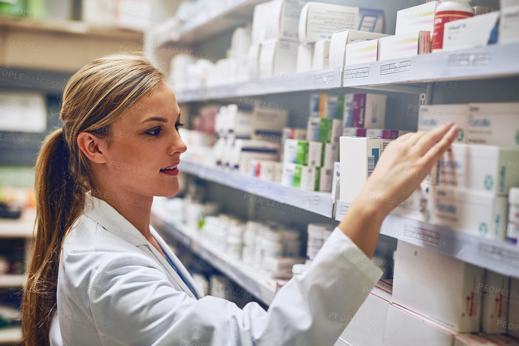 Buy stock photo Shot of a pharmacist at work