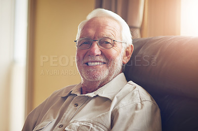 Buy stock photo Portrait, elderly man and smile on sofa in living room for relax, retirement or good mood. Happiness, pensioner and senior person with wisdom for confidence, comfortable or satisfaction in home