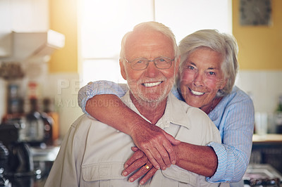 Buy stock photo Portrait of a happy senior couple spending time together at home