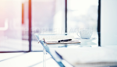 Buy stock photo Shot of a diary lying on a table in an empty office