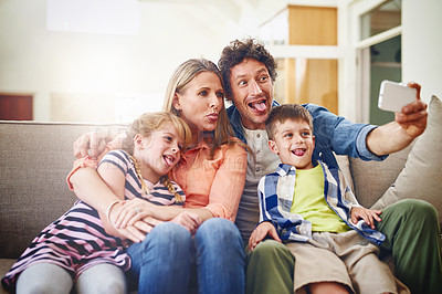 Buy stock photo Happy family, silly face and sofa with selfie for photography, funny picture or memory together at home. Mother, father and goofy children for bonding, holiday or weekend moment on couch at house