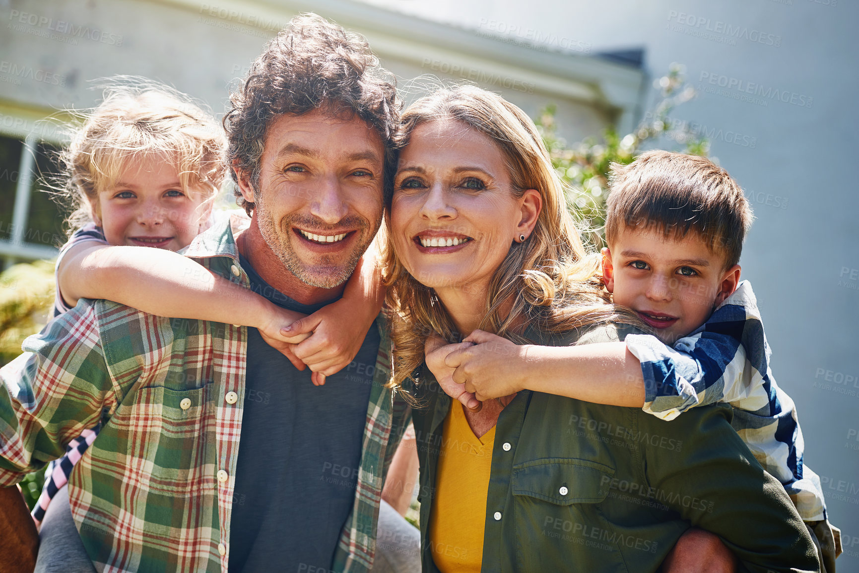 Buy stock photo Happy family, portrait and piggyback with children for bonding, holiday or weekend in backyard at home. Mother, father and kids with smile for hug, support or love for playful outdoor day together