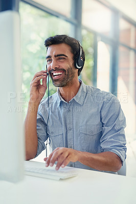 Buy stock photo Cropped shot of a call centre agent working in an office