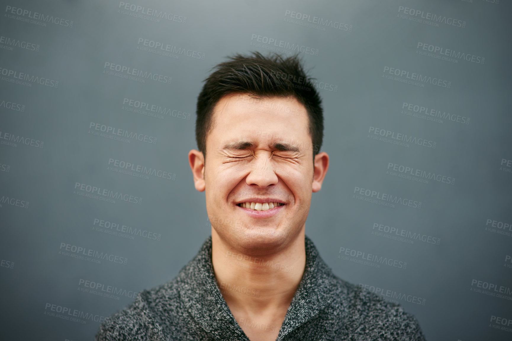 Buy stock photo Funny, embarrassed and man with eyes closed in studio for comic, joke or humor on gray background. Comedy, fail and male person with expression for silly decision, regret choice or memory on mockup