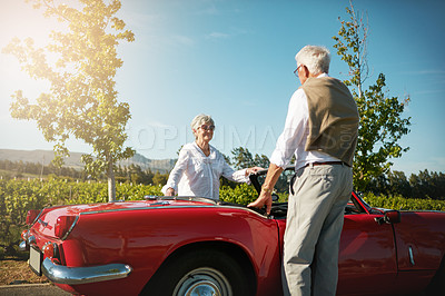 Buy stock photo Shot of a senior couple going on a road trip 