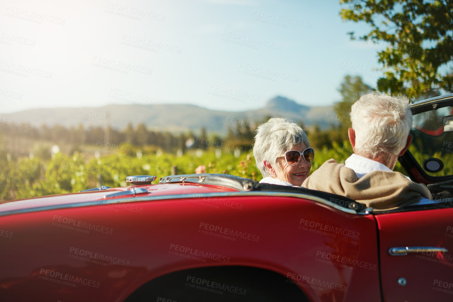 Buy stock photo Shot of a senior couple going on a road trip 