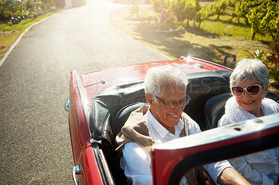 Buy stock photo Senior, couple and driving convertible car for holiday road trip or countryside retirement, transportation or summer. Man, woman and old people on travel journey in Napa country, exploring or happy