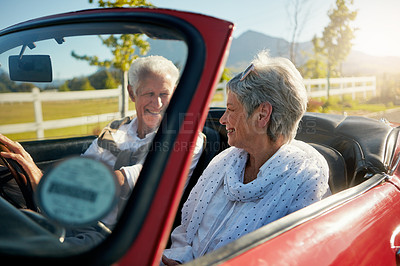 Buy stock photo Shot of a senior couple going on a road trip 