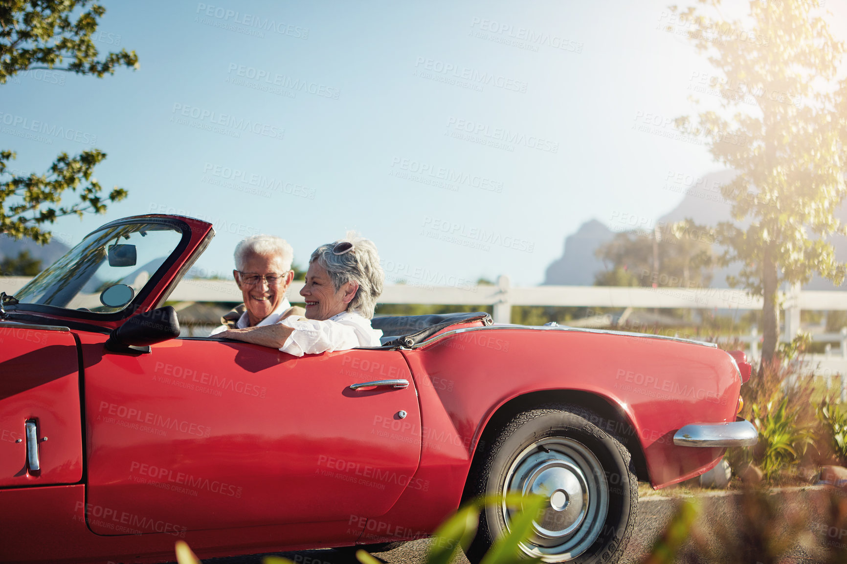 Buy stock photo Shot of a senior couple going on a road trip 