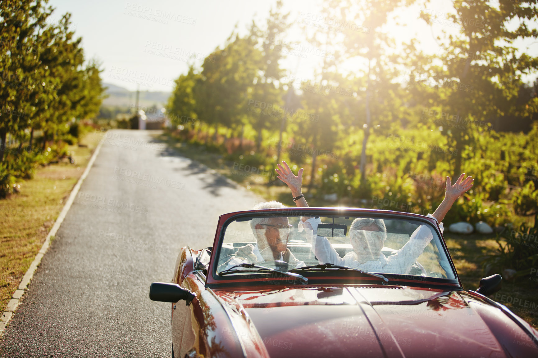 Buy stock photo Shot of a senior couple going on a road trip 