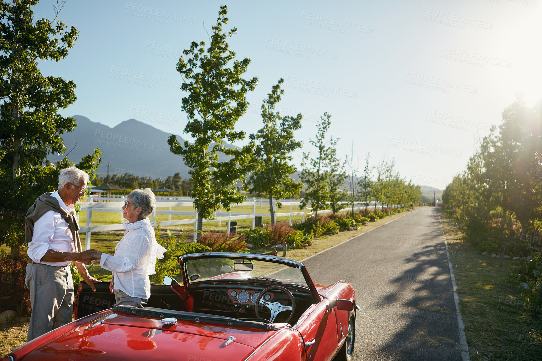 Buy stock photo Shot of a senior couple going on a road trip 