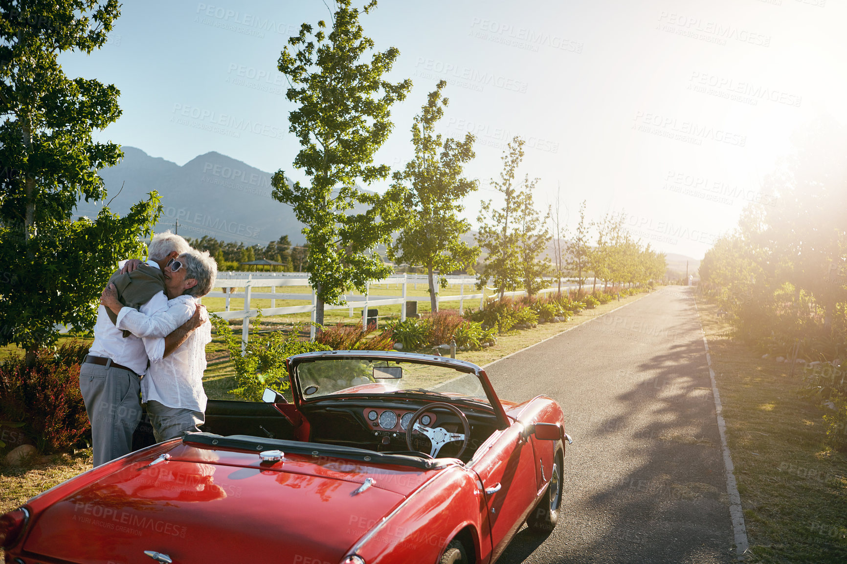 Buy stock photo Shot of a senior couple going on a road trip 