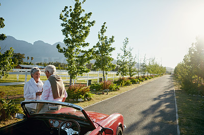 Buy stock photo Shot of a senior couple going on a road trip 