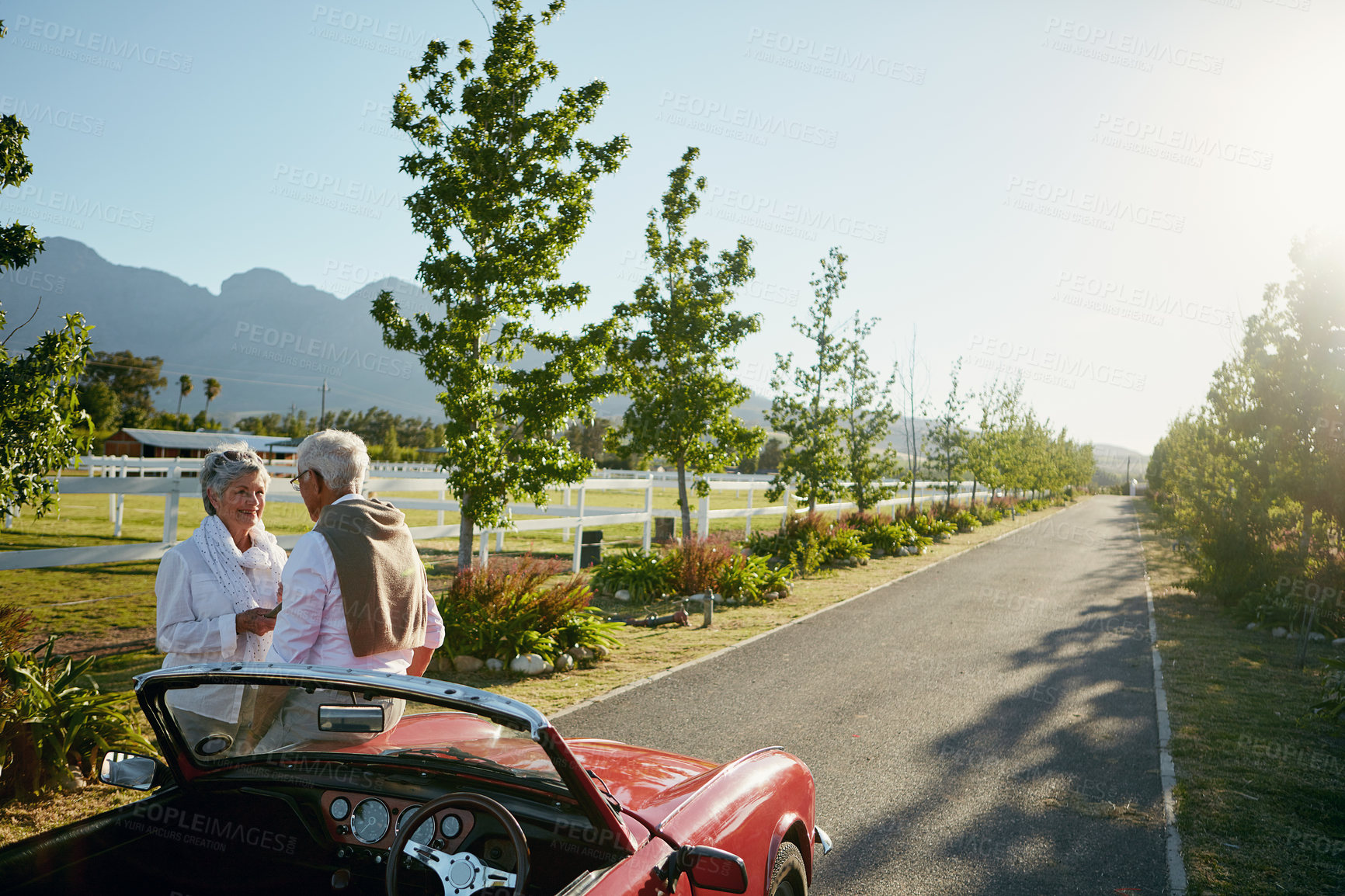 Buy stock photo Shot of a senior couple going on a road trip 