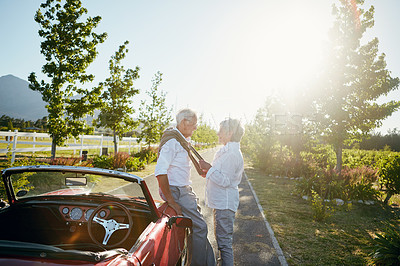 Buy stock photo Shot of a senior couple going on a road trip 