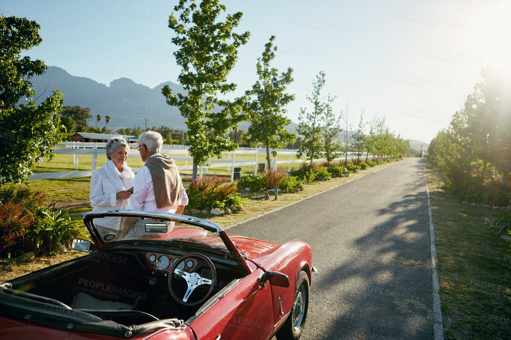 Buy stock photo Shot of a senior couple going on a road trip 