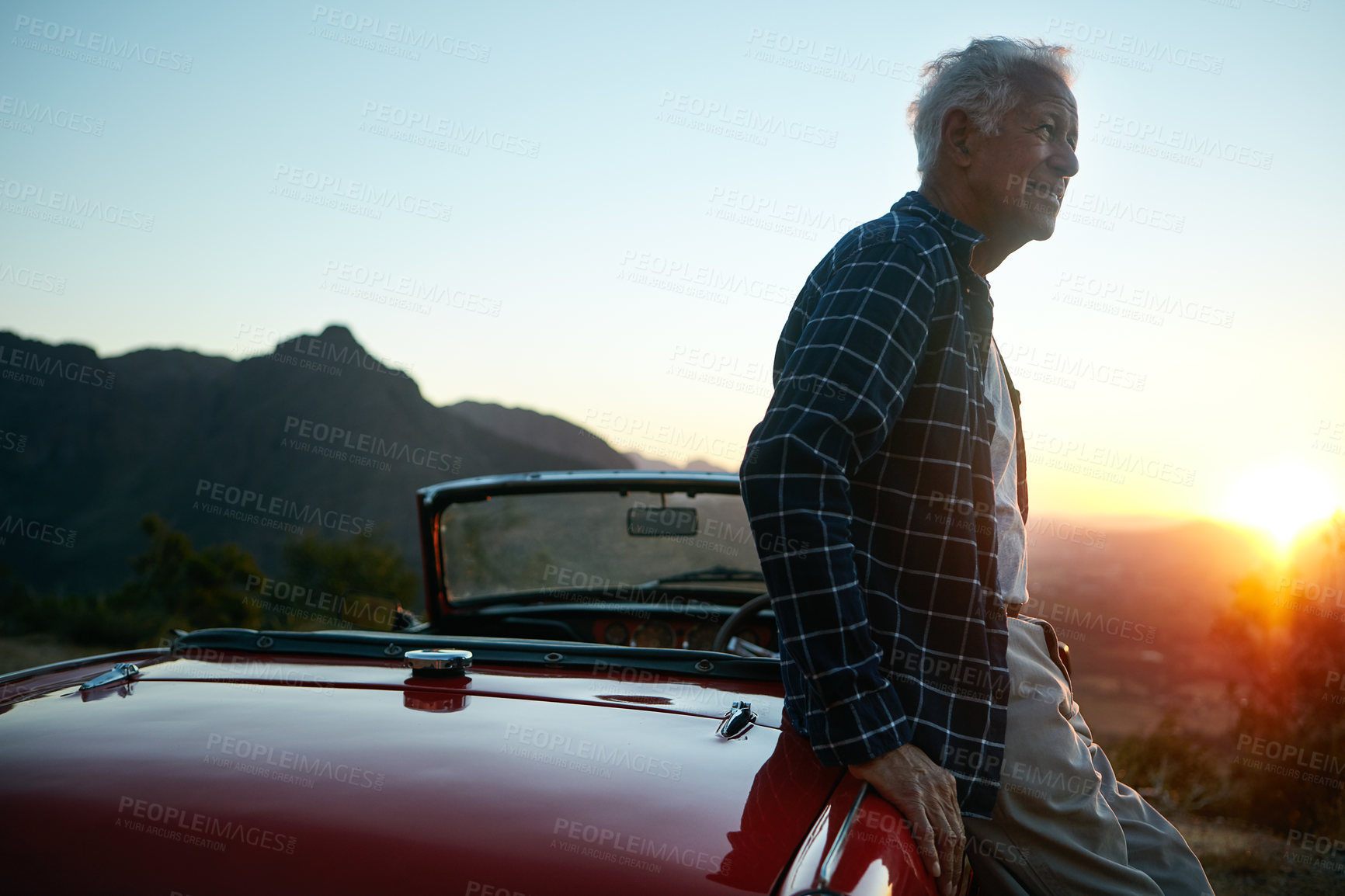 Buy stock photo Shot of a senior man out on a road trip