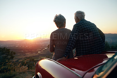 Buy stock photo Shot of a senior couple enjoying  a road trip