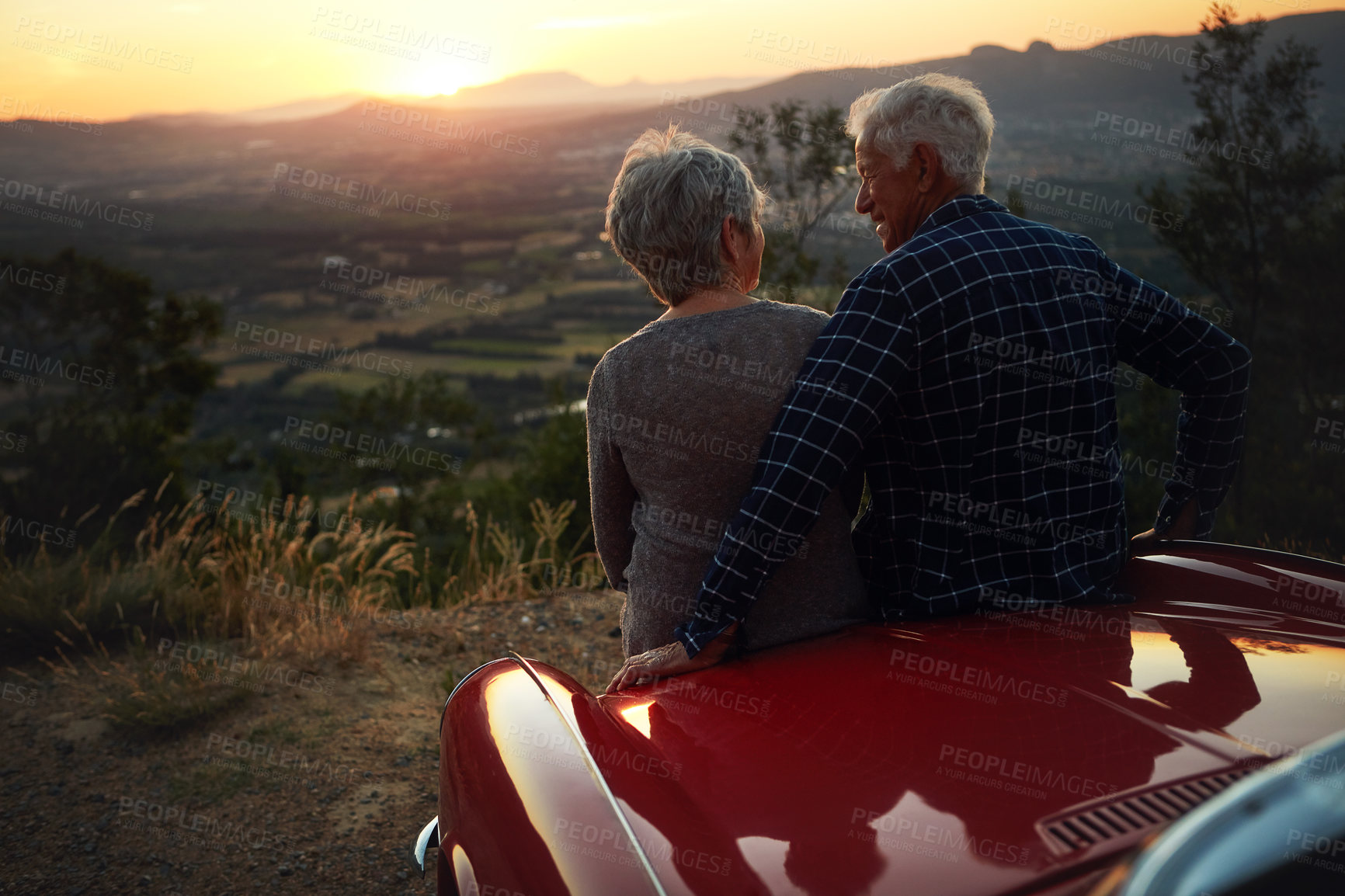 Buy stock photo Shot of a senior couple enjoying  a road trip