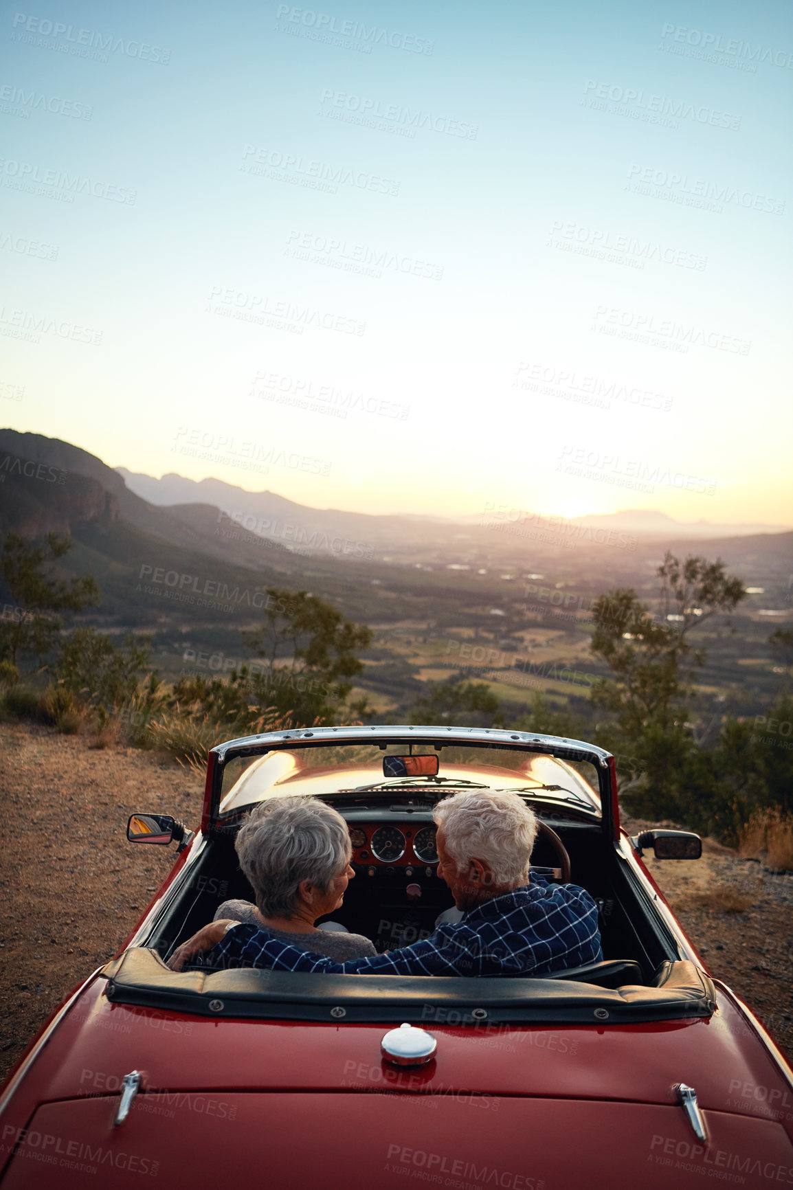 Buy stock photo Shot of a senior couple enjoying  a road trip