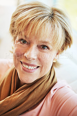 Buy stock photo Portrait, happy or senior woman in living room to relax with freedom on couch or sofa at home. Apartment, face or mature person with smile or wellness in retirement, lounge or house for resting break