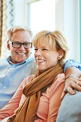 Buy stock photo Relax, laughing and senior couple on sofa for bonding, healthy relationship and marriage. Retirement, home and happy mature man and woman on couch for love, commitment and happiness in living room