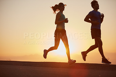 Buy stock photo Sunrise, couple and running outdoor with silhouette of training, exercise and fitness with cardio for health. Wellness, sport and athlete with runner partner in nature in the morning with sprint