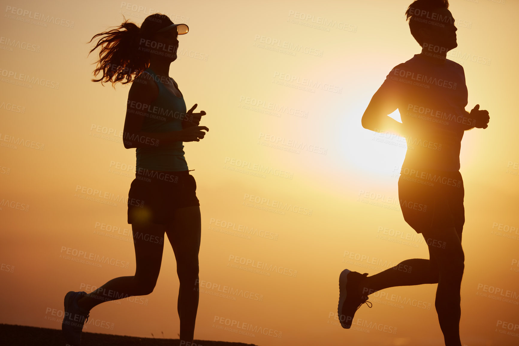 Buy stock photo Couple, silhouette and sunrise workout in outdoor, running and cardio challenge or marathon training. People, action and bonding together on jog in nature, fitness and sports coaching or practice