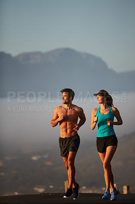 Buy stock photo Couple, running and exercise in outdoor, morning and cardio challenge or marathon training. People, relationship and bonding together on jog on mountain road, fitness and sports workout or practice