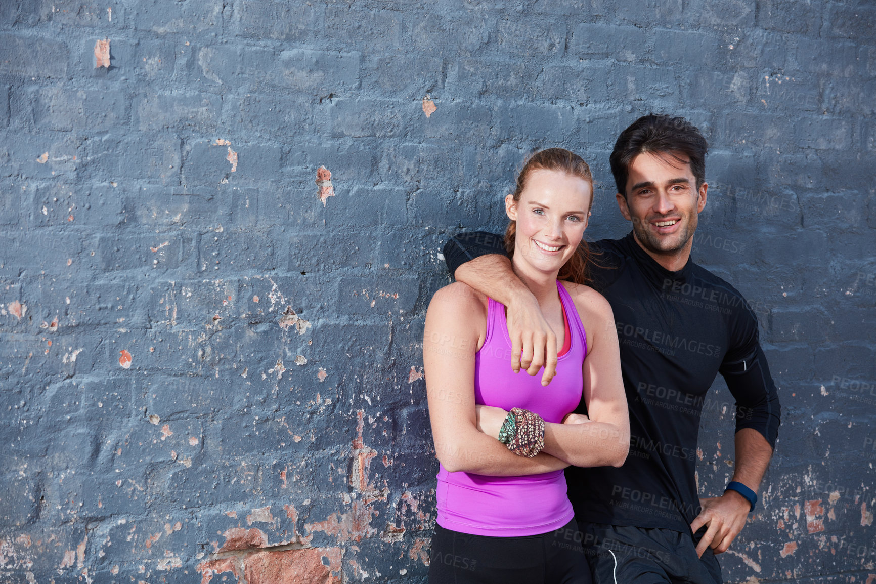 Buy stock photo Portrait of two training partners taking a break together outside