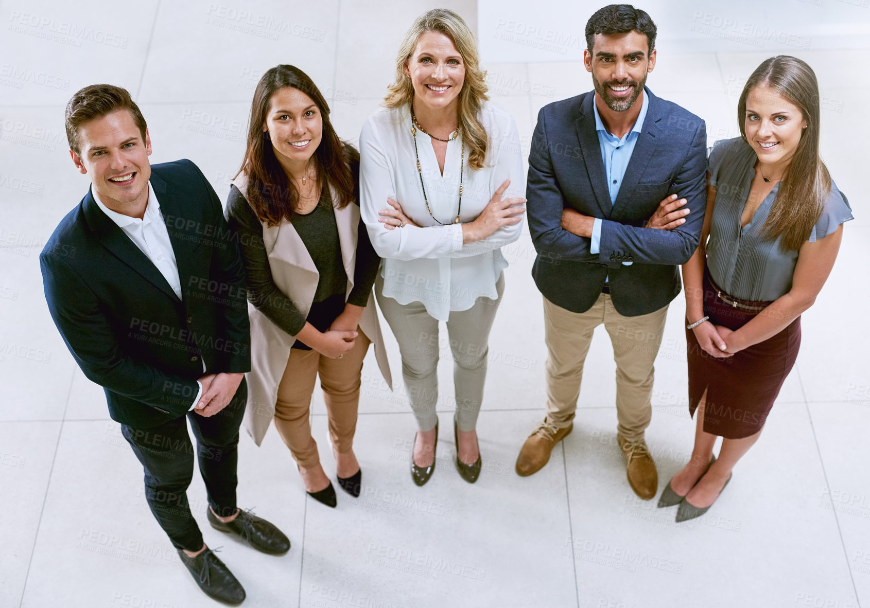 Buy stock photo Portrait of a group of businesspeople standing together in an office