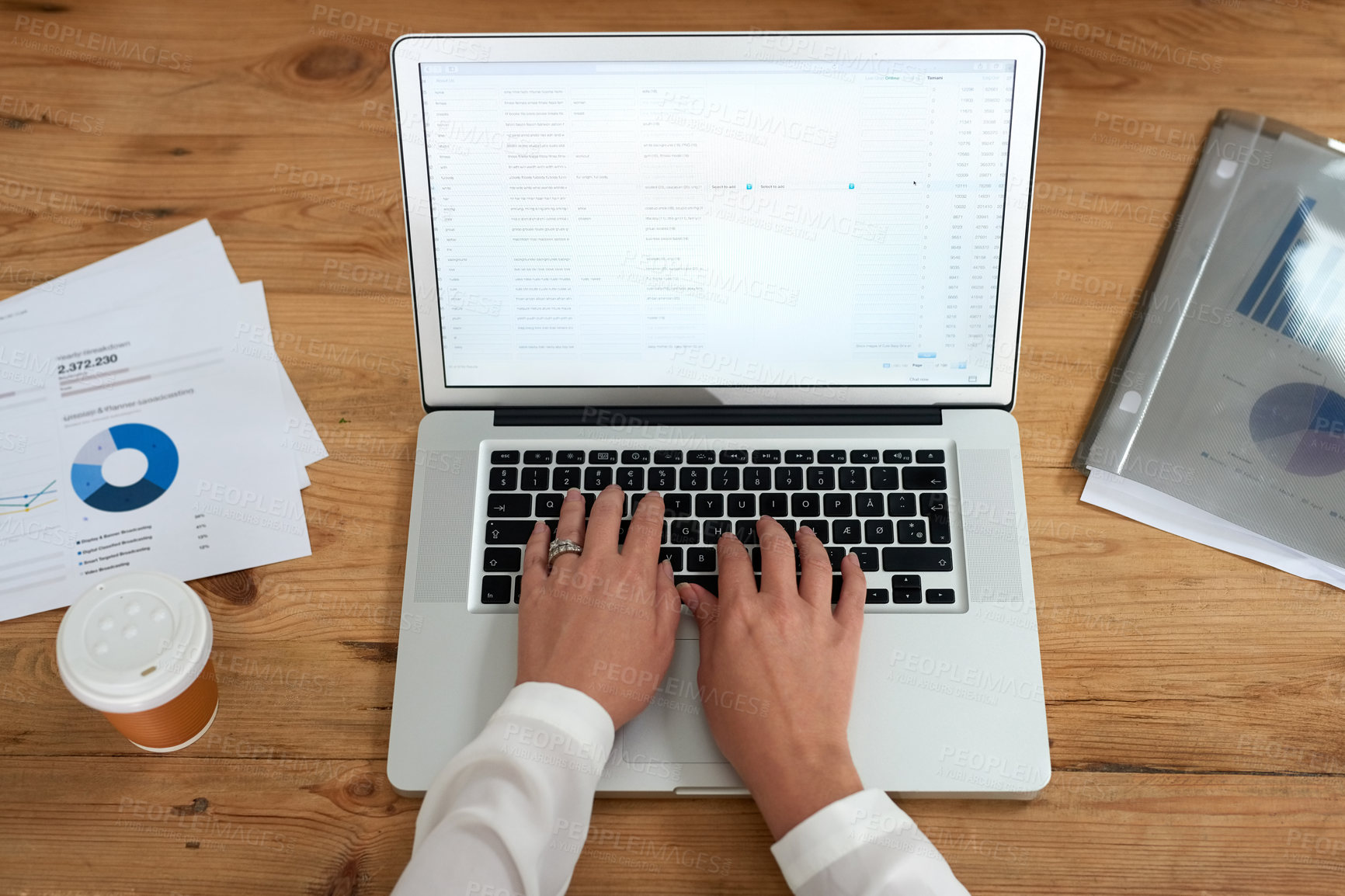 Buy stock photo High angle shot of businesswoman working on her laptop at her desk