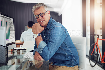 Buy stock photo Cropped portrait of a mature male designer working in the office