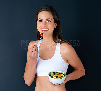 Buy stock photo Happy woman, portrait and salad bowl for diet, lose weight or natural nutrition in fitness against a studio background. Female person or model smile with vegetables for food, healthy meal and fiber