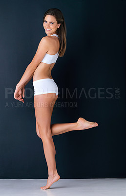 Buy stock photo Happy woman, portrait and body posing in underwear for diet, weight loss or fitness against a studio background. Attractive female person or model smile in slim, lean figure or health and wellness