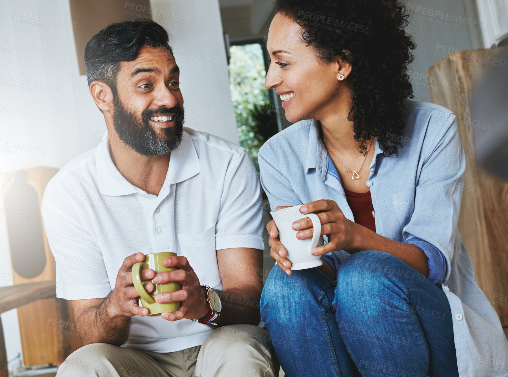 Buy stock photo Shot of a relaxed young enjoying the day at home together