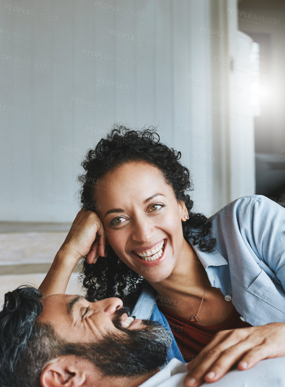 Buy stock photo Shot of a relaxed couple enjoying the day at home together