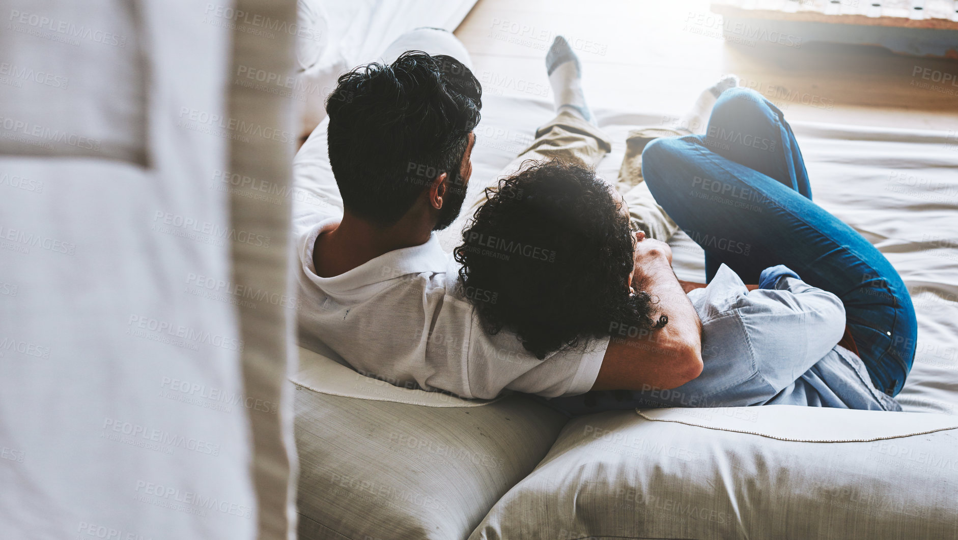 Buy stock photo Couple, people and back in home on sofa to relax for bonding, love and support on break together. Living room, relationship and hug in couch as family, soulmate and care to enjoy with trust in lounge