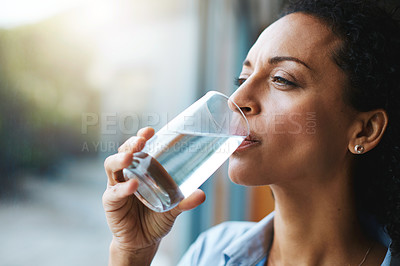 Buy stock photo Drinking water, glass and woman thinking of healthcare, wellness and self care at home. Fresh, clean liquid and african person in window of her house with vision for health, diet and nutrition
