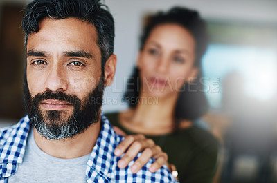 Buy stock photo Portrait of a distraught man being comforted by his wife at home