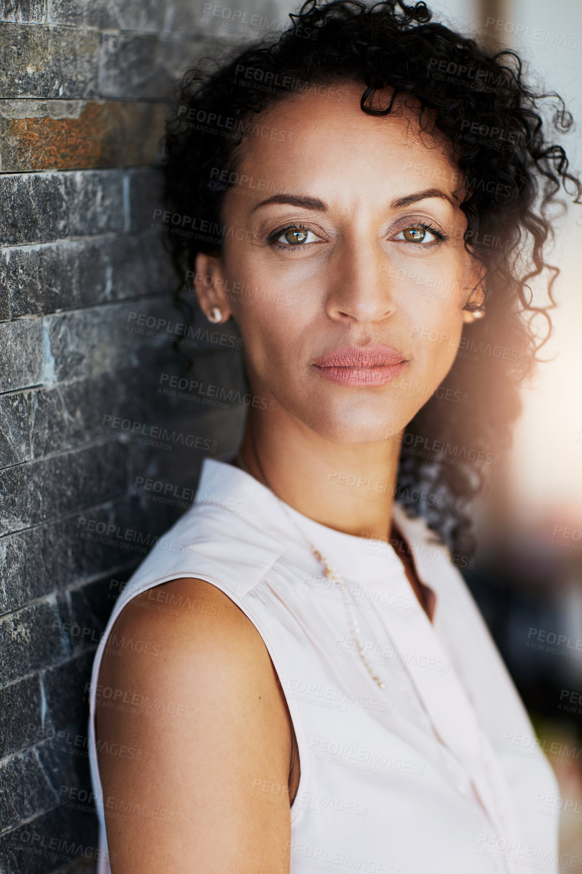 Buy stock photo African woman, cosmetics and portrait on brick wall for beauty, makeup or aesthetics for wellness. Female person, backdrop and skincare with eyeliner for business, corporate career in New York City